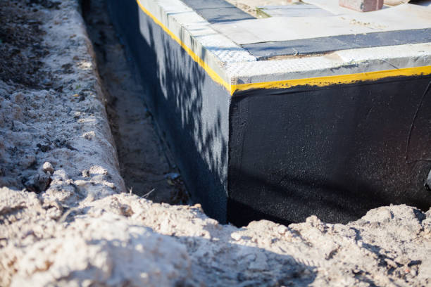 Professional Waterproofing technician working in Monticello, IN